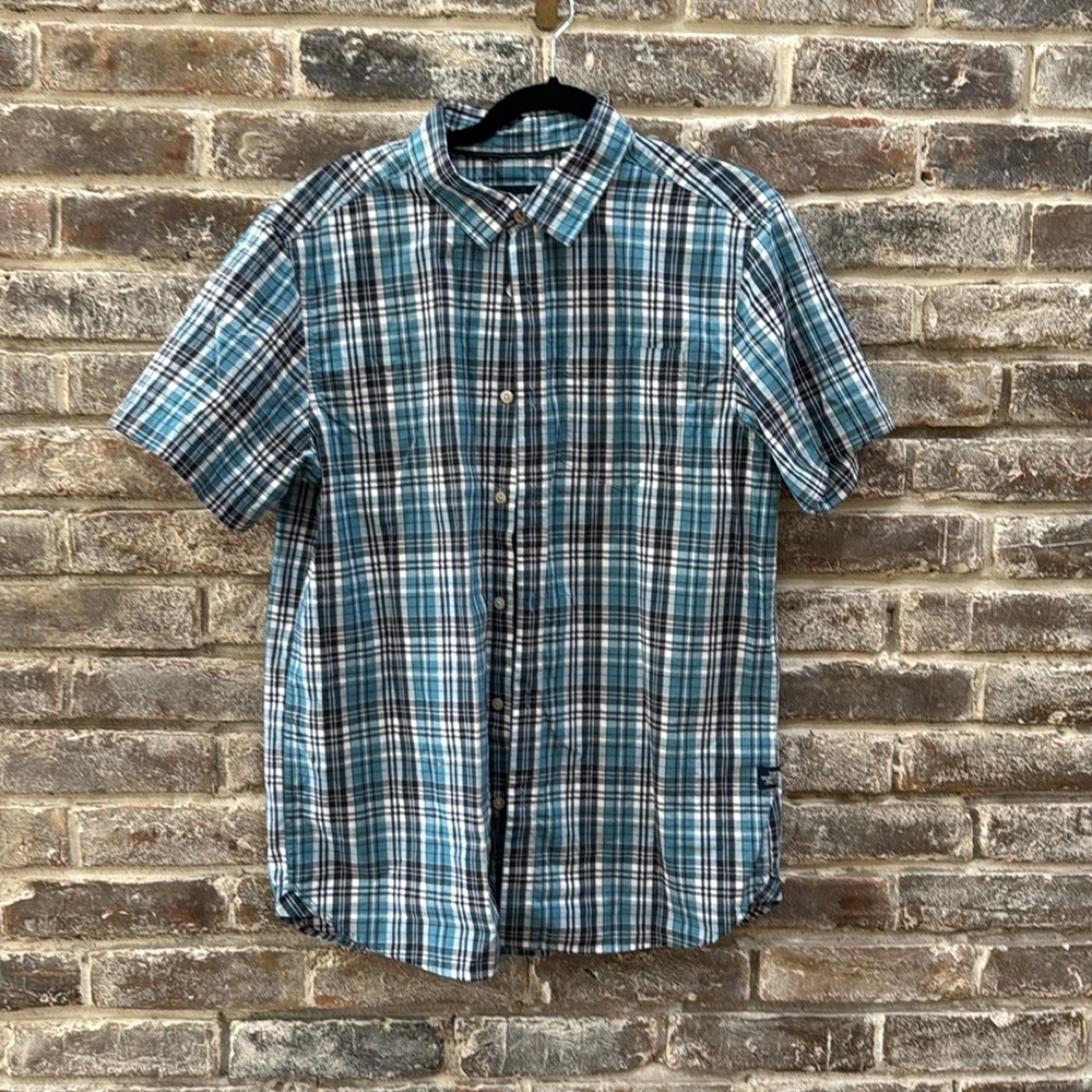 The North Face plaid dresss shirt, short sleeve.